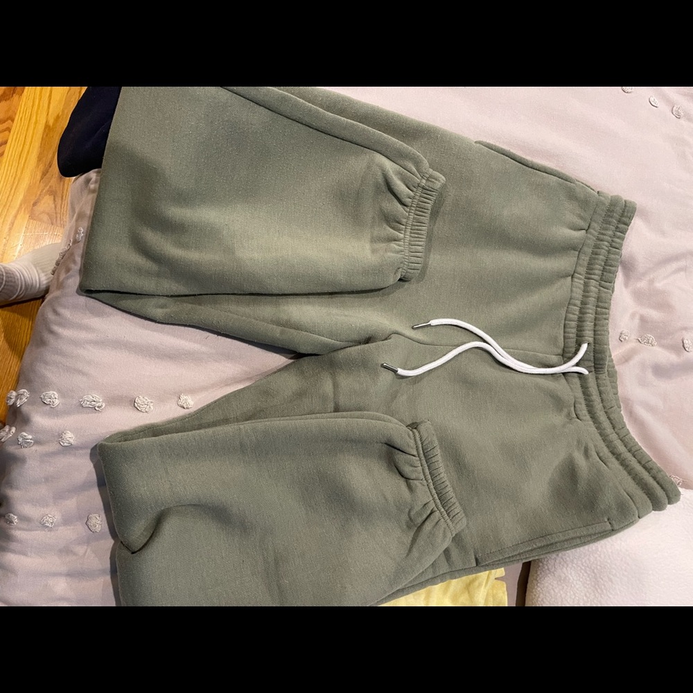 green sweatpants